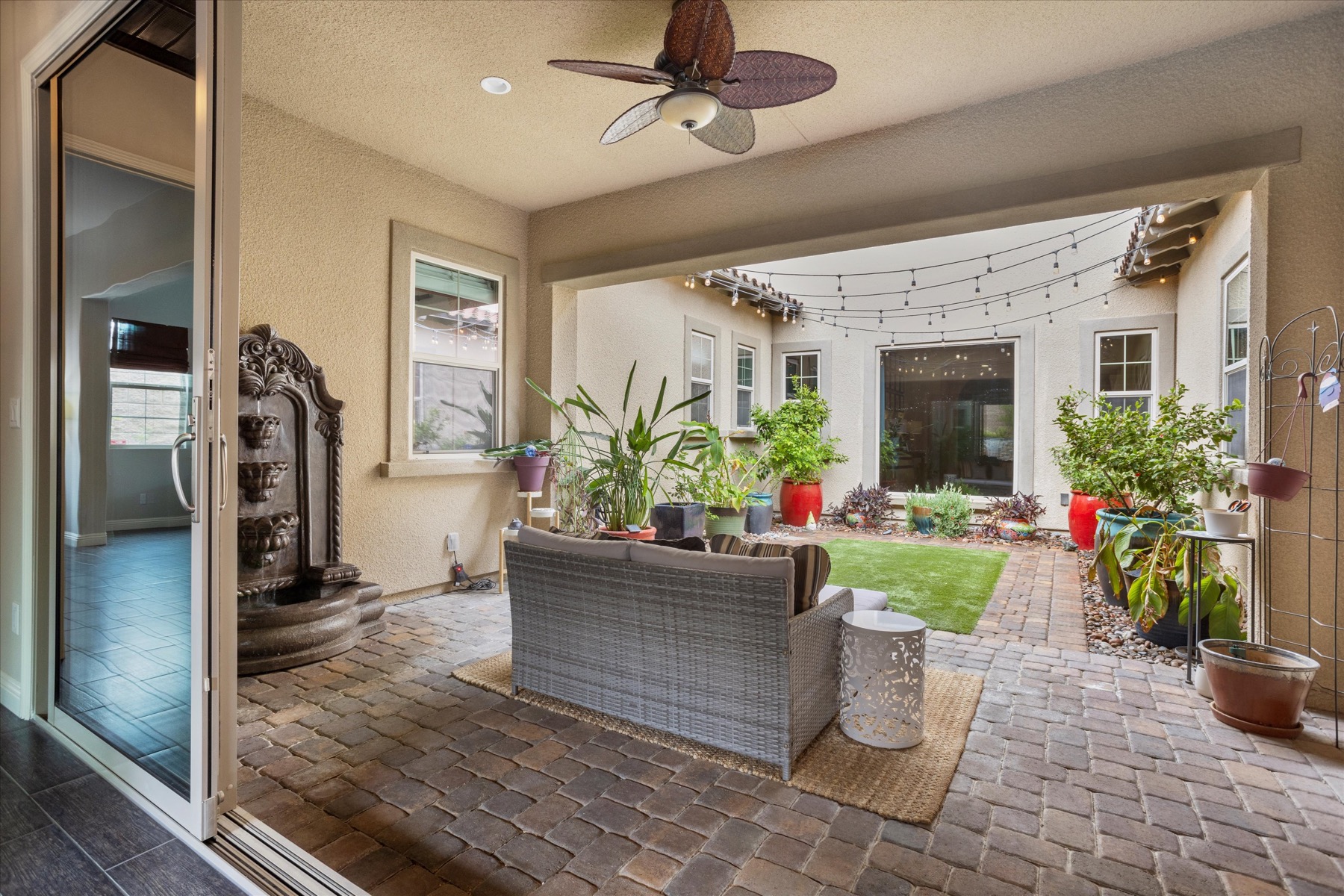 Private open-air courtyard with covered lounge