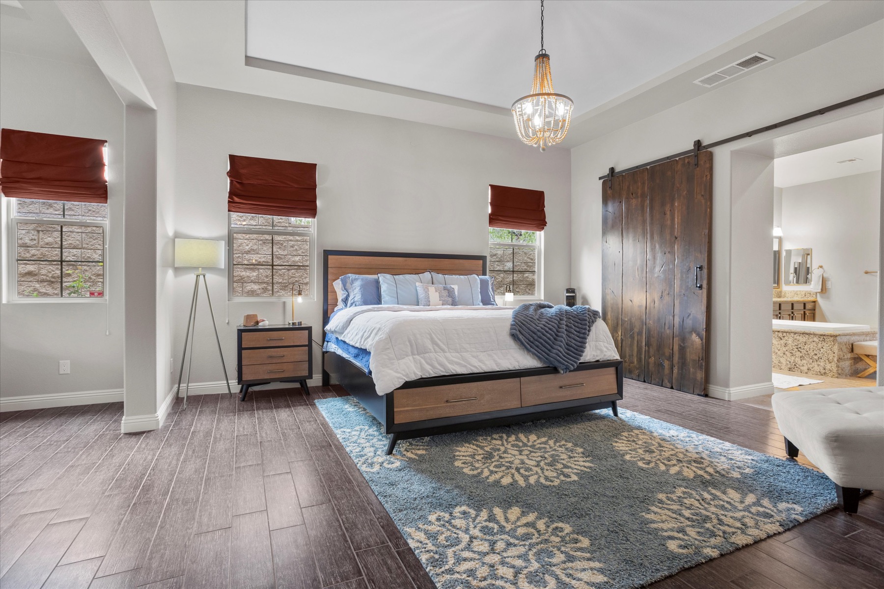 Main-level primary bedroom with sitting area